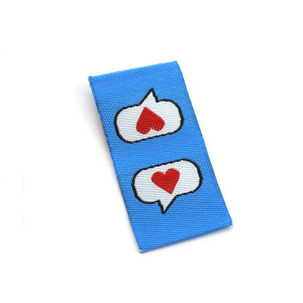 Blue fabric label with speech bubble and heart (Variant 1)