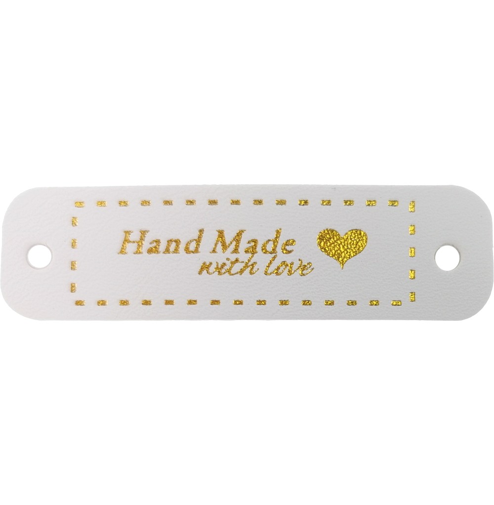 White leatherette label "Handmade ..." with golden letters