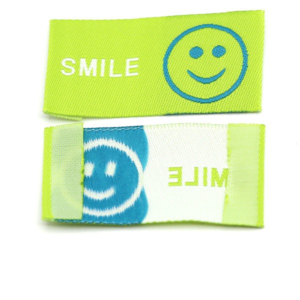 Smiley türkis mit weißer Aufschrift "smile" auf hellgrün